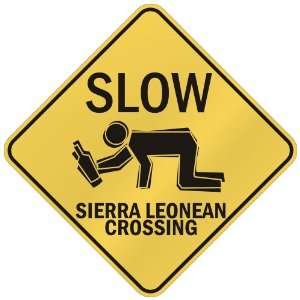     SLOW : SIERRA LEONEAN CROSSING  SIERRA LEONE: Home Improvement