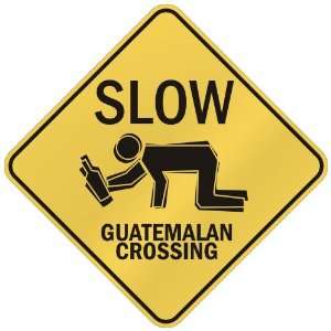   SLOW : GUATEMALAN CROSSING  GUATEMALA: Home Improvement