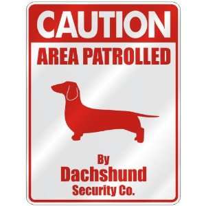 CAUTION  AREA PATROLLED BY DACHSHUND SECURITY CO.  PARKING SIGN DOG
