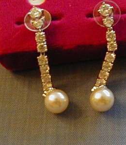 JACQUELINE KENNEDY SILVER TONE CLEAR CRYSTAL AND FAUX PEARL EARRINGS 