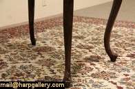  1880s Victorian rosewood table has graceful curved legs and an oval 